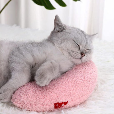 Coussin-orthopedique-pour-chat-ultra-doux en tissus rose moelleux design ergonomique pour le confort articulaire